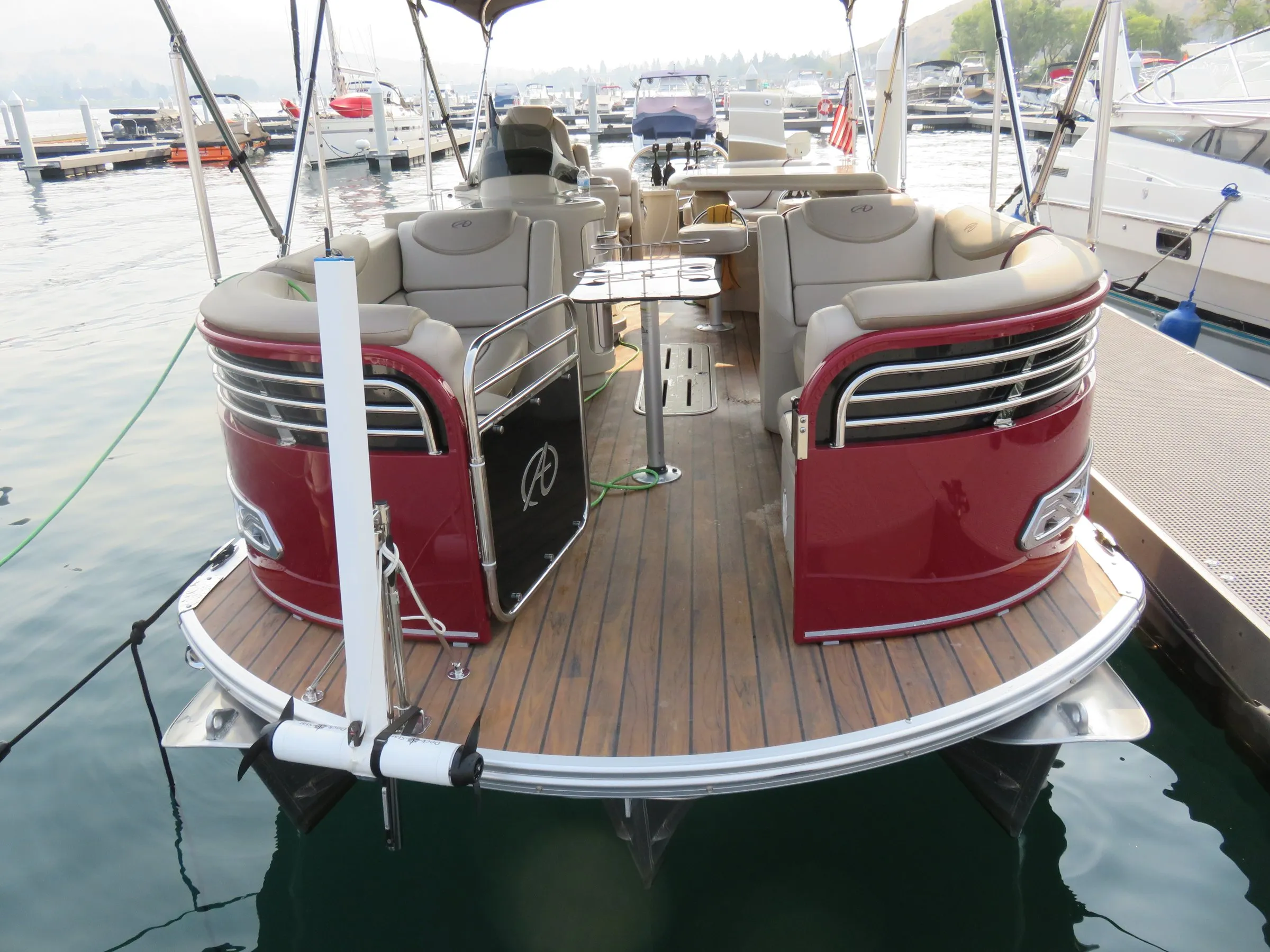 A DockStar on a track at the corner of a pontoon deck, pod raised.